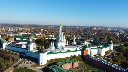 Fototapeta premium Sergiev Posad, Russia - 08 October 2021: Autumn view of the Holy Trinity Lavra of St. Sergius from a bird's eye view