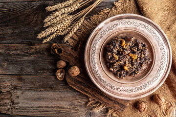 kutya traditional Slavic holiday ritual dish with wheat, poppy, walnuts and honey. Slavic holiday ritual dish. banner, menu, recipe place for text, top view