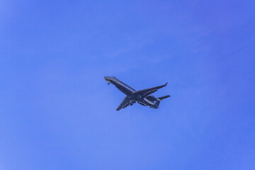 Jet plane in blue sky on a sunny day