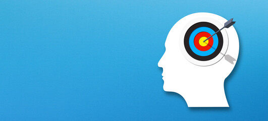 Brain of thinking about target and strategy. Target sign in human head with copy space on blue...