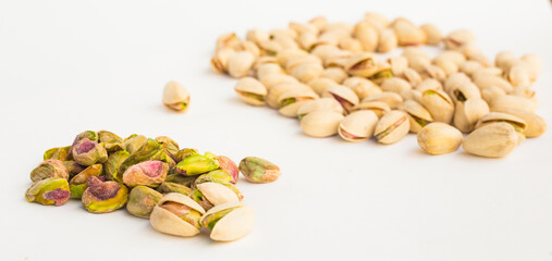roasted pistachios on white background