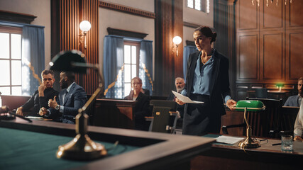 Court of Justice and Law Trial: Female Public Defender Presenting Case, Making Passionate Speech to...