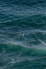 Blue waves on the beach. Mediterranean Sea in Almería, Andalucía Spain in summer.