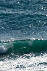 Blue waves on the beach. Mediterranean Sea in Almería, Andalucía Spain in summer.