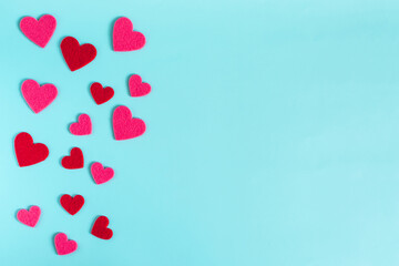 Light blue with multicolored hearts of red and pink colors