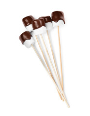 Tasty marshmallows dipped into chocolate on white background, top view
