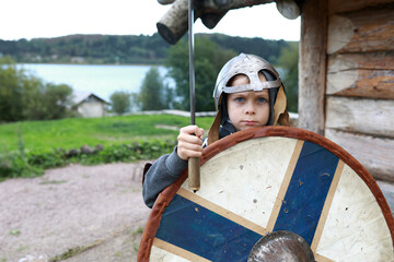 Child posing in Viking Armor