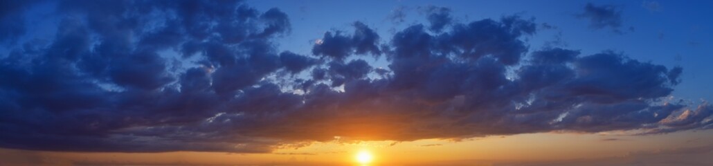 Naklejka na ściany i meble beautiful panorama sky with clouds at sunset
