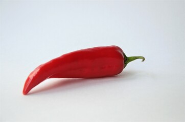 red pepper on a white background, minimalism