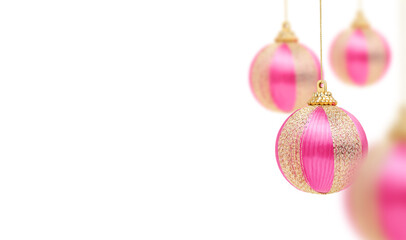 pink christmas balls on a white background