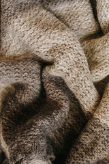 Beige autumn knitting wool texture background.
