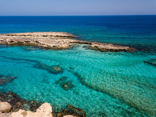 Fototapeta na wymiar Aerial view on clear blue water of Mediterranean Sea. Cyprus