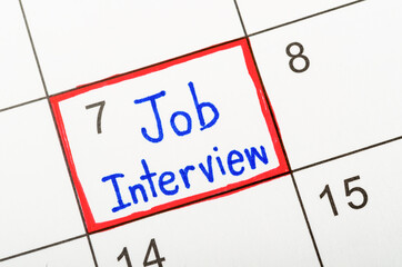 The words Job Interview written in calendar.