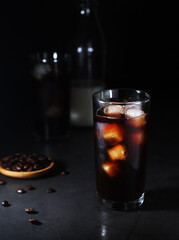 Cold coffee with ice in low key