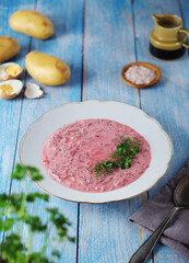 A plate with cold beetroot soup - national dish of Baltic region