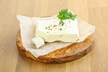 Greek Feta cheese over board