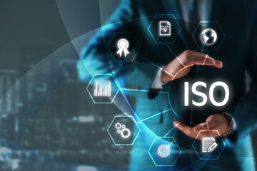 Man demonstrating at virtual icon with abbreviation ISO and different icons, closeup