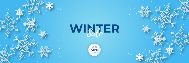 Blue shiny winter christmas sale banner with snow, palm tree, snowflake, and mountain.