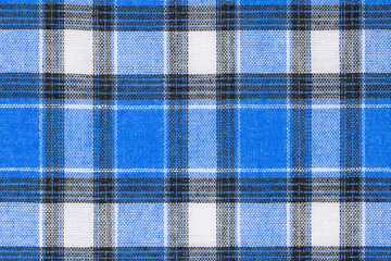 Blue white tartan texture background. shirt fabric with a checkered pattern. factory material