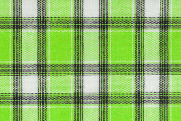 Green white tartan texture background. shirt fabric with a checkered pattern. factory material