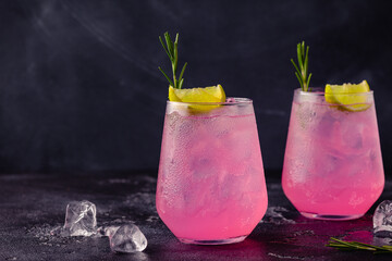 Refreshing pink drink or cocktail with ice