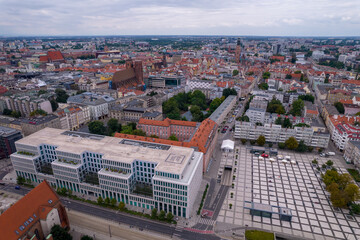 Wrocław, a city in Poland on a sunny and slightly cloudy day. Main Railway Station, Market Square in Wrocław and characteristic places. - obrazy, fototapety, plakaty