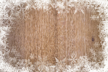 wood texture with snow ornament frame