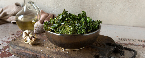 a bowl of kale cabbage chips on the table