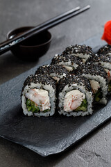 sushi with chopsticks