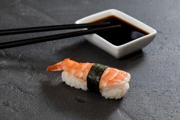 sushi with chopsticks