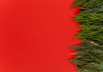 Christmas background. New year card with christmas tree on red background. top view. copy space.
