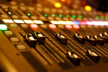 Sliders on the audio console. Close up music mixer.