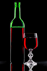 Glasses of wine on a black background.