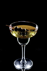 Glasses of wine on a black background.