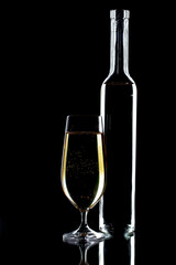 Glasses of wine on a black background.