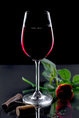 Glasses of wine on a black background.