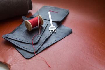 Leather. Sewing a wallet. Leather work. Tools for sewing bags, wallets, clutches. Sewing products...