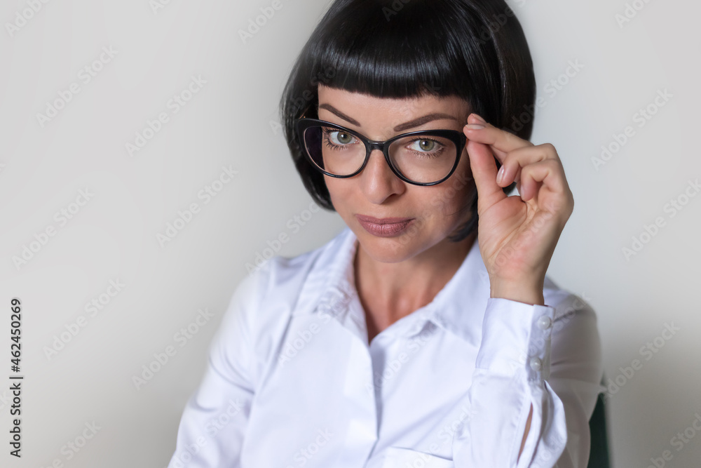 Wall mural portrait of a woman with glasses