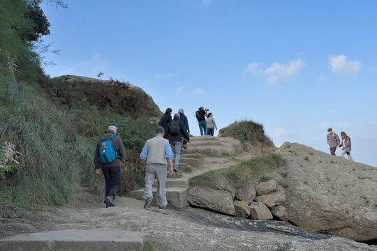 Senior hikers on a path in Brittany France
