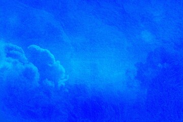 Fototapeta na wymiar Blue grunge background. Beautiful clouds with glossy backdrop