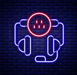 Glowing neon line Taxi call telephone service icon isolated on brick wall background. Taxi for smartphone. Colorful outline concept. Vector