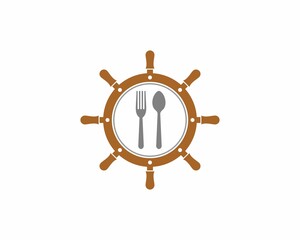 Ship steering wheel with fork and spoon inside