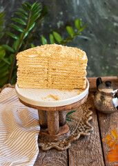 A cutaway honey cake. Side view. Layer cake.