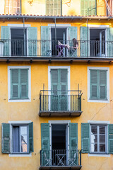 facades of buildings in the historic old town of Nice