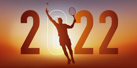Concept du sport sur le thème du tennis pour une carte de vœux 2022, montrant un tennisman faisant un service.