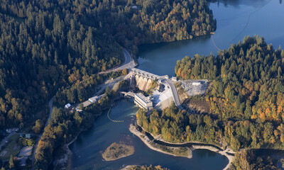 Aerial view from airplane of a water dam by Hayward Lake. Taken near Mission, East of Vancouver,...