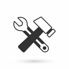 Grey Crossed hammer and wrench spanner icon isolated on white background. Hardware tools. Vector