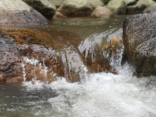 water flowing over rocks