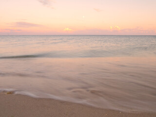 Fototapeta na wymiar Beautiful sunset on a beach. Summer sunset.