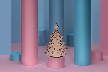 Abstract Christmas pink and blue background, mock up minimal scene geometry shape podium. Stage pedestal with Christmas tree. Podium, pedestal or platform for the presentation of products.